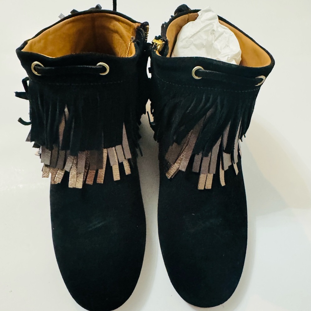 Beautiful suede fringe black boots. Running small, size 37 = US size 6.